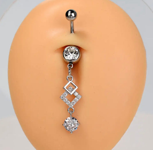 Silver Dangling 14G Belly Button Ring for Navel Piercing Cute Embedded With White Rhinestones On Silicone Belly Display White Background